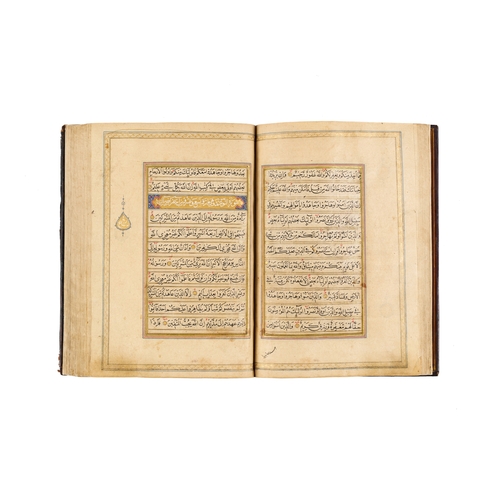 119 - A LARGE ILLUMINATED MUGHAL QURAN WITH SEAL OF MUTAMAD AL-SULTAN MUZAFFAR AL-DIN SHAH This impressive... 