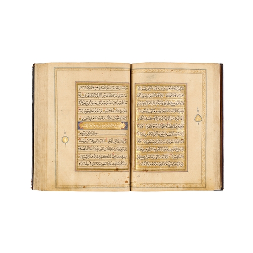 119 - A LARGE ILLUMINATED MUGHAL QURAN WITH SEAL OF MUTAMAD AL-SULTAN MUZAFFAR AL-DIN SHAH This impressive... 