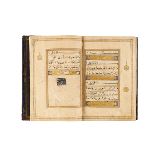 119 - A LARGE ILLUMINATED MUGHAL QURAN WITH SEAL OF MUTAMAD AL-SULTAN MUZAFFAR AL-DIN SHAH This impressive... 