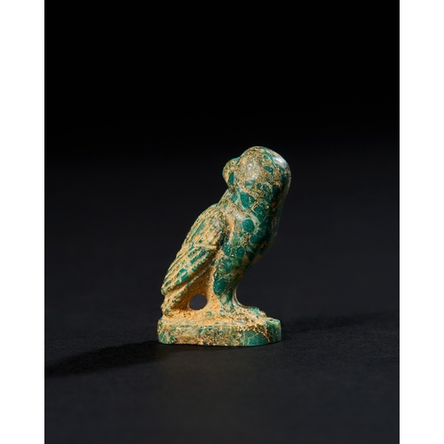 12 - GREEN STONE OF A SEATED OWL WITH A AMULETIC CONCEPT, CIRCA 2ND - 3RD CENTURY A.D. This beautifully c... 