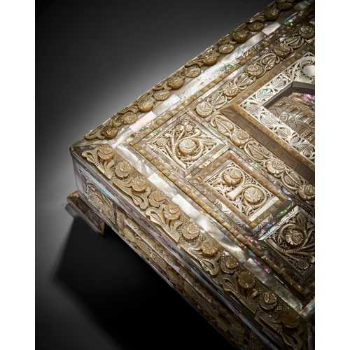 122 - A CEREMONIAL MOTHER OF PEARL CASKET AND QURAN, 20TH CENTURY The box is designed to hold a rare copy ... 