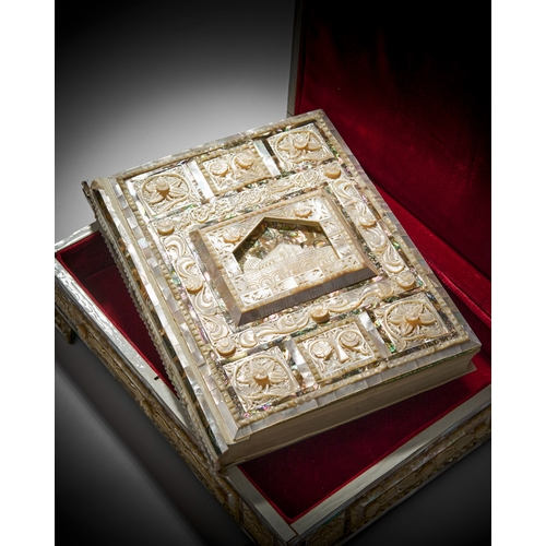 122 - A CEREMONIAL MOTHER OF PEARL CASKET AND QURAN, 20TH CENTURY The box is designed to hold a rare copy ... 