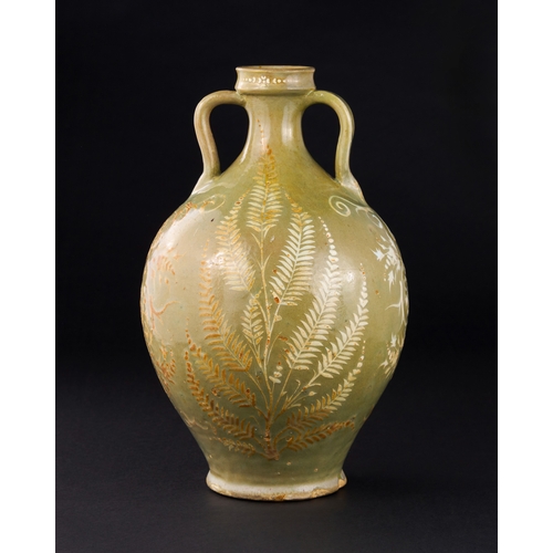 147 - A SAFAVID CELADON POTTERY VASE, PERSIA, 17TH CENTURY of bulbous form on a short splayed foot with wa... 