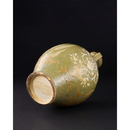 147 - A SAFAVID CELADON POTTERY VASE, PERSIA, 17TH CENTURY of bulbous form on a short splayed foot with wa... 