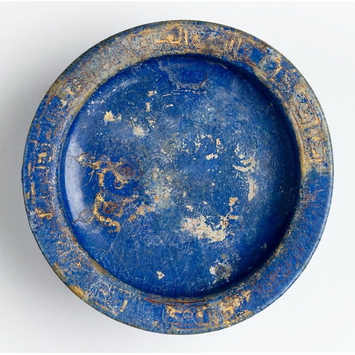 150 - A LAJVARDINA POTTERY FOOTED BOWL, PERSIA, 13TH/14TH CENTURY    of circular form with vertical sides ... 