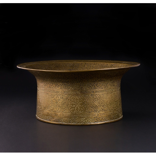 162 - A MAMLUK ENGRAVED BRASS BASIN, EGYPT OR SYRIA, EARLY 16TH CENTURY of waisted form with flaring evert... 