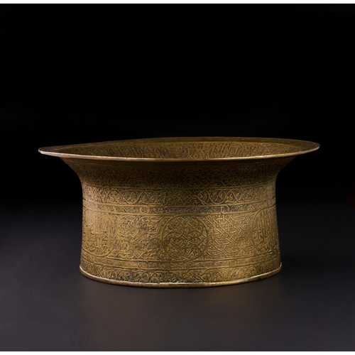 162 - A MAMLUK ENGRAVED BRASS BASIN, EGYPT OR SYRIA, EARLY 16TH CENTURY of waisted form with flaring evert... 