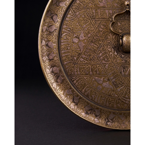 163 - A CALLIGRAPHIC INSCRIBED SELJUK BRONZE CIRCULAR MIRROR, PERSIA, 12TH CENTURY A CALLIGRAPHIC INSCRIBE... 