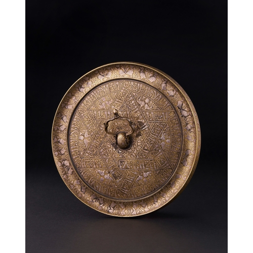 163 - A CALLIGRAPHIC INSCRIBED SELJUK BRONZE CIRCULAR MIRROR, PERSIA, 12TH CENTURY A CALLIGRAPHIC INSCRIBE... 