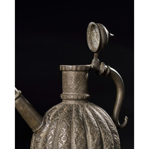 168 - A FINELY ENGRAVED 18TH CENTURY MUGHAL INDIAN TINNED COPPER EWER    An exquisite 18th century Mughal ... 