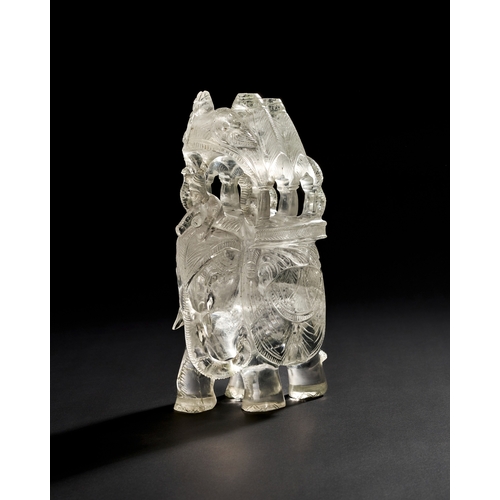 201 - A LARGE 19TH CENTURY INDIAN CARVED ROCK CRYSTAL ELEPHANT WITH HOWDAH AND RIDER    This impressive 19... 