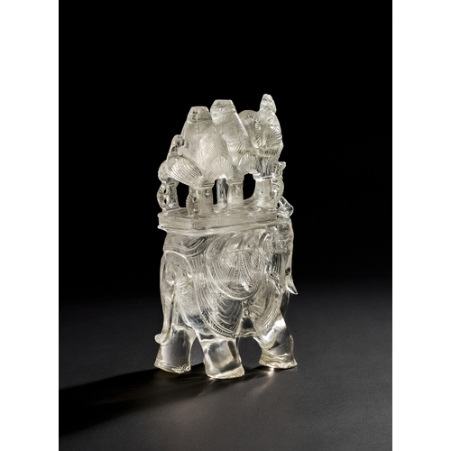 201 - A LARGE 19TH CENTURY INDIAN CARVED ROCK CRYSTAL ELEPHANT WITH HOWDAH AND RIDER    This impressive 19... 