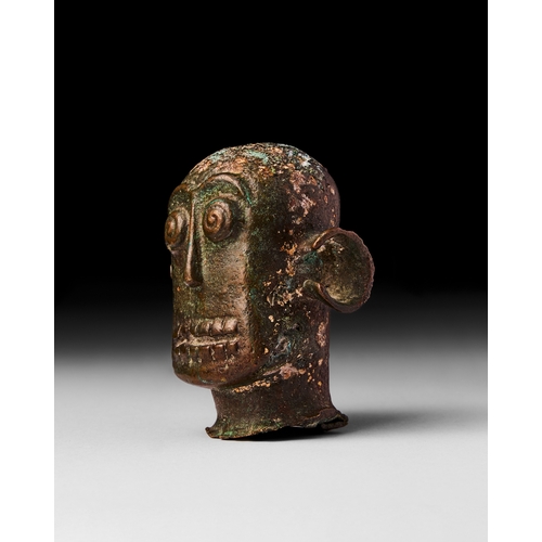 91 - ANCIENT PRE-COLUMBIAN BRONZE HEAD, AZTEC PERIOD, 13TH - 14TH CENTURY A.D. A bronze head dates to the... 