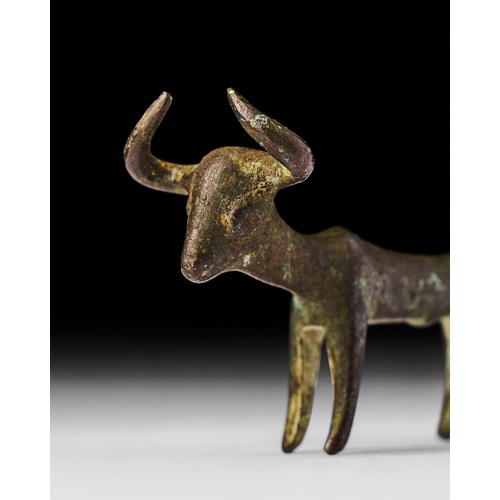 96 - A HITTITE BRONZE BULL, CIRCA 14TH-13TH CENTURY B.C. A HITTITE BRONZE BULL, CIRCA 14TH-13TH CENTURY B... 