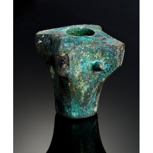 1 - AN ANCIENT BRONZE MACE HEAD, MID FIRST MILLENNIUM B.C A robust bronze mace head from the mid-first m... 