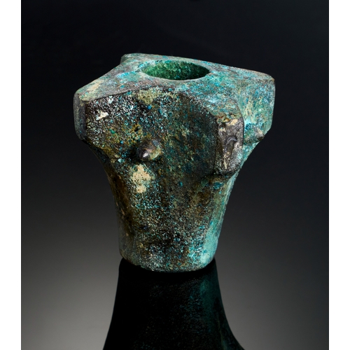 1 - AN ANCIENT BRONZE MACE HEAD, MID FIRST MILLENNIUM B.C A robust bronze mace head from the mid-first m... 