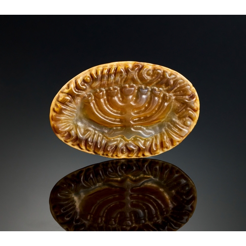 13 - A BANDED AGATE WITH THE DEPICTION OF MENORAH AND HEBREW INSCRIPTION AROUND, MEDIEVAL OR EARLIER An e... 