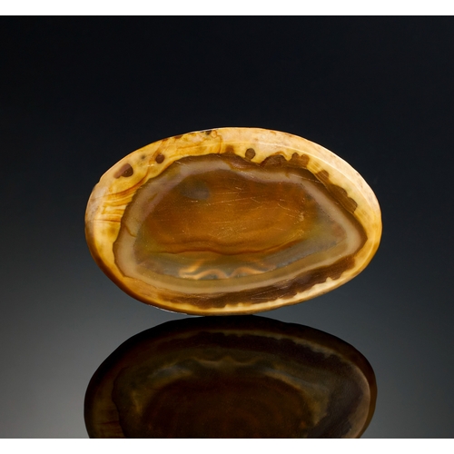 13 - A BANDED AGATE WITH THE DEPICTION OF MENORAH AND HEBREW INSCRIPTION AROUND, MEDIEVAL OR EARLIER An e... 