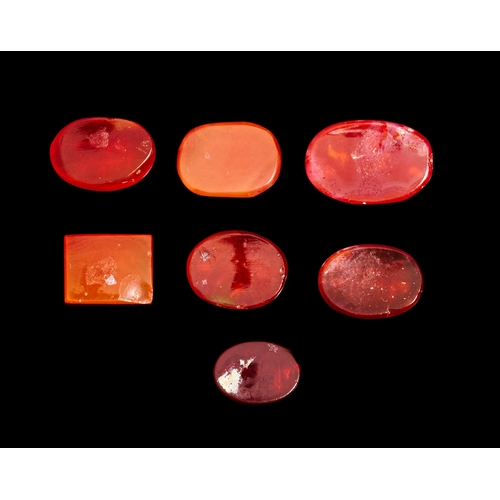 131 - SEVEN EARLY ISLAMIC AGATE SEALS OR RING STONES, 9TH - 12TH CENTURY  SEVEN EARLY ISLAMIC AGATE SEALS ... 