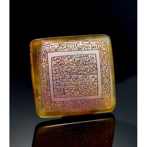 140 - A LARGE SQUARE INSCRIBED ISLAMIC AGATE PLAQUE, 19TH CENTURY  A19th-century Islamic agate plaque feat... 