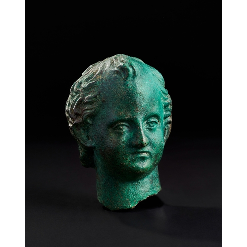 15 - A BRONZE ROMAN HEAD OF A YOUTH, 2ND CENTURY A.D. OR LATER



An exceptional bronze head of a youth, ... 