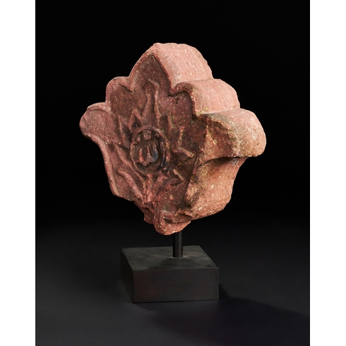 157 - A CARVED RED STONE FINIAL, MUGHAL INDIA, 17TH CENTURY  A carved red stone finial from 17th-century M... 