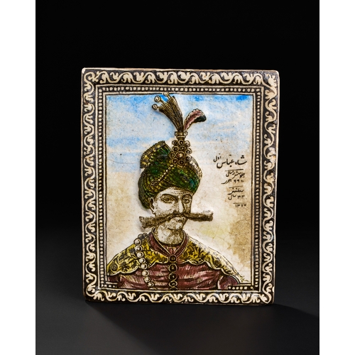 166 - A QAJAR MOULDED POTTERY TILE DEPICTING SHAH ABBAS THE GREAT, PERSIA, DATED AH 1317/ AD 1899-1900 of ... 