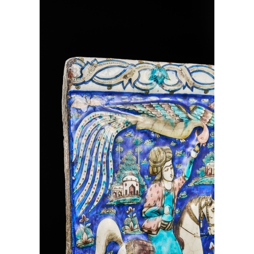 168 - A LARGE QAJAR GLAZED MOULDED POTTERY TILE DEPICTING A MAN ON A HORSE, 19TH CENTURY  A Qajar glazed a... 