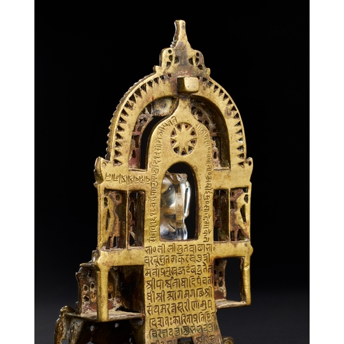 173 - A RARE AND IMPORTANT SOUTH INDIAN SILVER INALID BRASS OR BRONZE JAIN SHRINE WITH ROCK CRYSTAL DEITY,... 