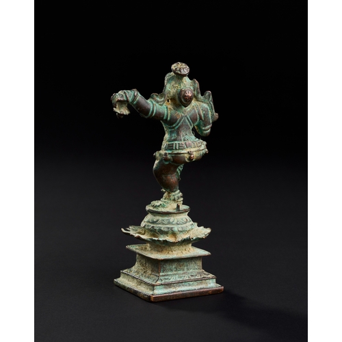 175 - A 17TH CENTURY OR EARLIER SOUTH INDIAN BRONZE FIGURE OF DANCING KRISHNA A 17TH CENTURY OR EARLIER SO... 