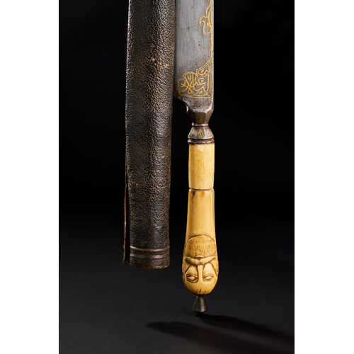 181 - A FINE GOLD INALID DAGGER WITH A MAN SHAPED WALRUS HILT, PERSIA, 19TH CENTURY  A 19th-century Persia... 