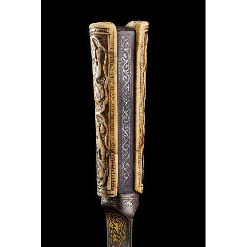 185 - AN EARLY 19TH CENTURY QAJAR BONE HILTED DAGGER WITH SILVER AND GOLD INALID WATERED STEEL BLADE An ea... 