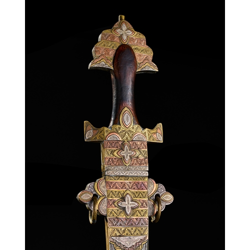 194 - A LARGE NORTH AFRICAN TUAREG SILVER, COPPER AND BRASS INALID SWORD, 19TH CENTURY  A19th-century Nort... 