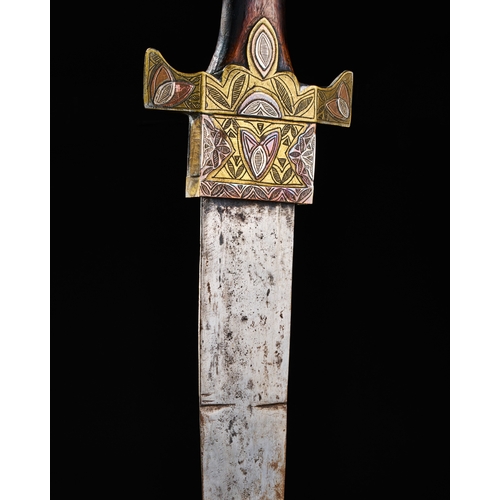 194 - A LARGE NORTH AFRICAN TUAREG SILVER, COPPER AND BRASS INALID SWORD, 19TH CENTURY  A19th-century Nort... 