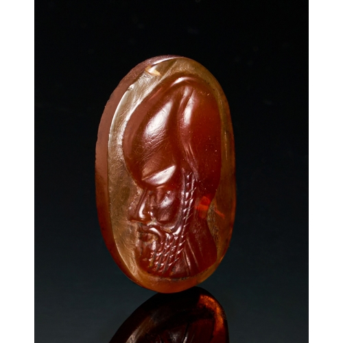 20 - A RARE AGATE CAMEO OF A MAN, LATE PTOLEMAIC PERIOD A finely carved agate cameo from the Late Ptolema... 