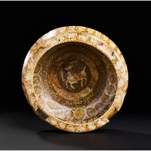 210 - A KASHAN LUSTRE POTTERY BOWL DATED IN THE MIIDLE, PERSIA, 12TH -13TH CENTURY 
H: 11.5cm, Diameter: 2... 