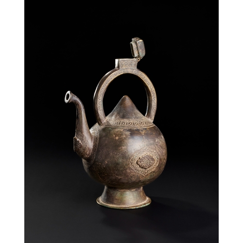 230 - A FINE ENGRAVED KETTLE SHAPED BRONZE EWER, SAFAVID, 17TH CENTURY  A17th-century Safavid bronze ewer ... 