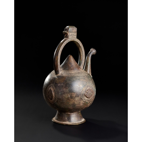 230 - A FINE ENGRAVED KETTLE SHAPED BRONZE EWER, SAFAVID, 17TH CENTURY  A17th-century Safavid bronze ewer ... 