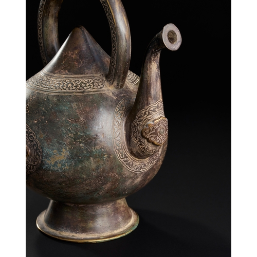 230 - A FINE ENGRAVED KETTLE SHAPED BRONZE EWER, SAFAVID, 17TH CENTURY  A17th-century Safavid bronze ewer ... 