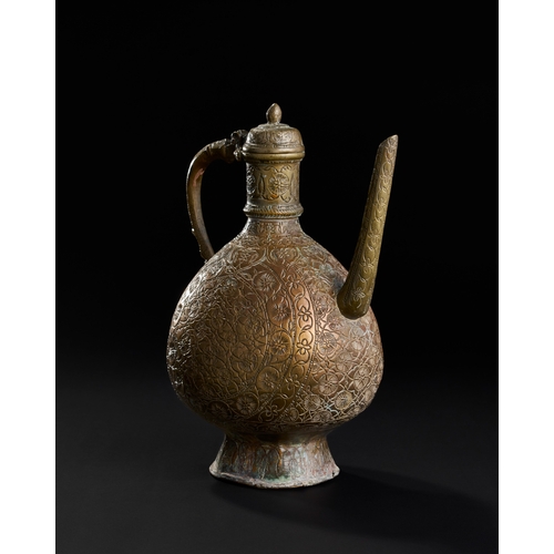 231 - AN 18TH CENTURY ENGRAVED MUGHAL BRONZE EWER, NORTH INDIA, LAHORE  AN 18TH CENTURY ENGRAVED MUGHAL BR... 