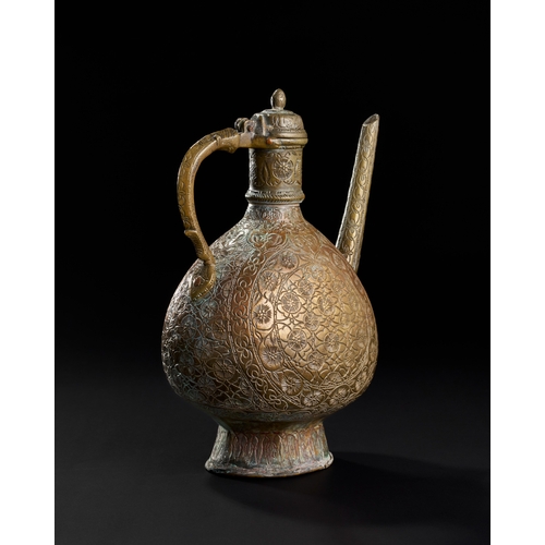 231 - AN 18TH CENTURY ENGRAVED MUGHAL BRONZE EWER, NORTH INDIA, LAHORE  AN 18TH CENTURY ENGRAVED MUGHAL BR... 