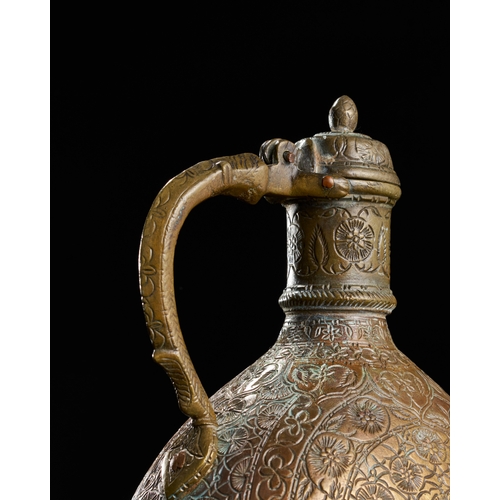 231 - AN 18TH CENTURY ENGRAVED MUGHAL BRONZE EWER, NORTH INDIA, LAHORE  AN 18TH CENTURY ENGRAVED MUGHAL BR... 