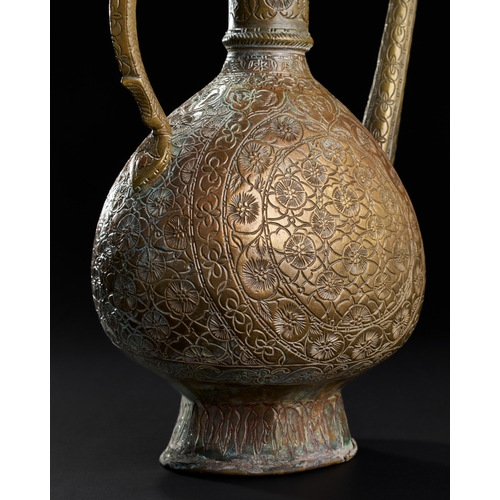 231 - AN 18TH CENTURY ENGRAVED MUGHAL BRONZE EWER, NORTH INDIA, LAHORE  AN 18TH CENTURY ENGRAVED MUGHAL BR... 