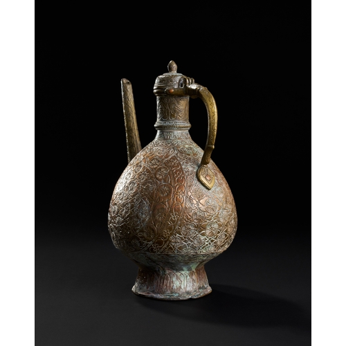 231 - AN 18TH CENTURY ENGRAVED MUGHAL BRONZE EWER, NORTH INDIA, LAHORE  AN 18TH CENTURY ENGRAVED MUGHAL BR... 