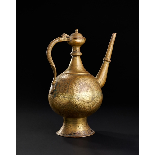 232 - A FINELY ENGRAVED MUGHAL BRASS EWER, NORTH INDIA, LAHORE, 18TH CENTURY A FINELY ENGRAVED MUGHAL BRAS... 