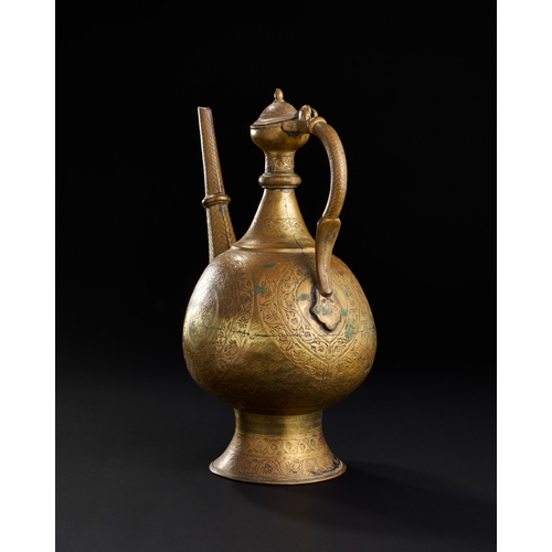 232 - A FINELY ENGRAVED MUGHAL BRASS EWER, NORTH INDIA, LAHORE, 18TH CENTURY A FINELY ENGRAVED MUGHAL BRAS... 