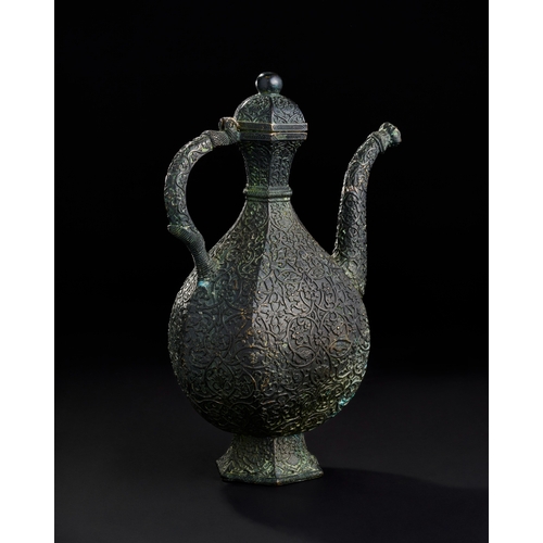 234 - AN ENGRAVED BRONZE MUGHAL INDIAN EWER, DECCAN, 19TH CENTURY  A 19th-century bronze ewer from the Dec... 