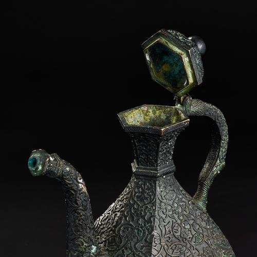 234 - AN ENGRAVED BRONZE MUGHAL INDIAN EWER, DECCAN, 19TH CENTURY  A 19th-century bronze ewer from the Dec... 