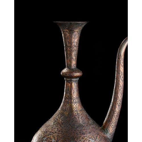 235 - AN ENGRAVED COPPER EWER AND BASIN,PERSIA, 19TH CENTURY A 19th-century Safavid Revival copper ewer an... 