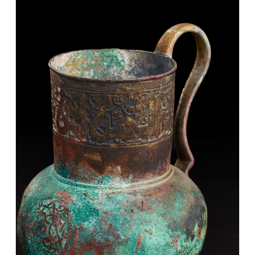 238 - A SPANISH BRONZE JUG WITH KUFIC CALLIGRAPHY, 12TH - 14TH CENTURY  A SPANISH BRONZE JUG WITH KUFIC CA... 